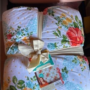 Floral Quilt with Red and Green Accents